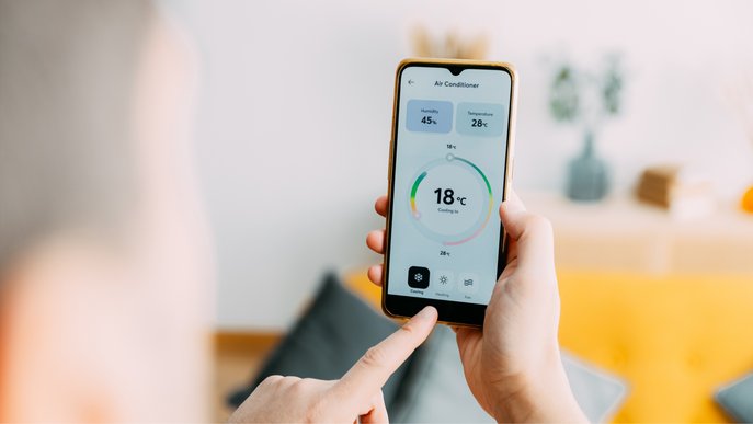 Bild zeigt einen Smartphone-Screen mit einer App zur Regelung der Raumtemperatur. 