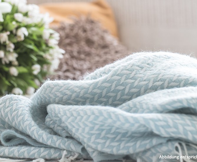 Eine kuschelige Wohndecke ist der Gewinn und verspricht behagliche Wärme sowie entspannte Momente zum Wohlfühlen.